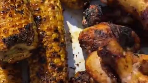 Grilled chicken legs and corn