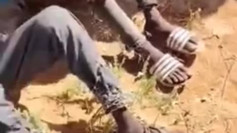 war criminal “abu lulu” humiliating some Civilians then executing them mercilessly