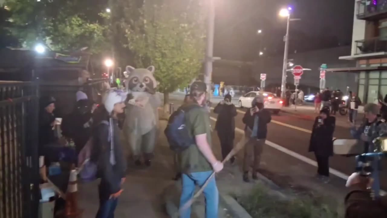 Antifa militants swarm a man and prevent him from using a public sidewalk near