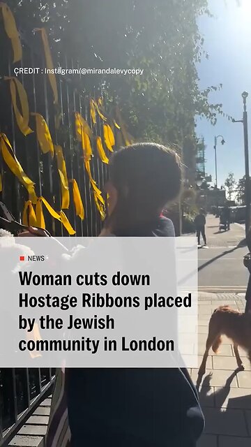 Woman caught cutting down yellow hostage ribbons in London. #Israel #London #japd