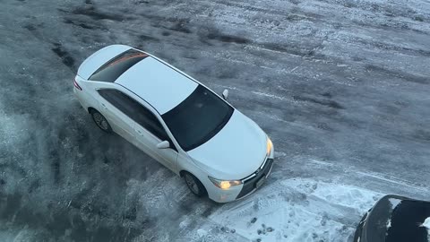 Denver Drivers Struggle on Icy Hill