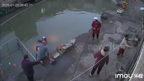 Elderly woman riding electric scooter crashes into canal before residents rescue her