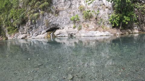 Swimming in a Turquoise river in Pozuzo