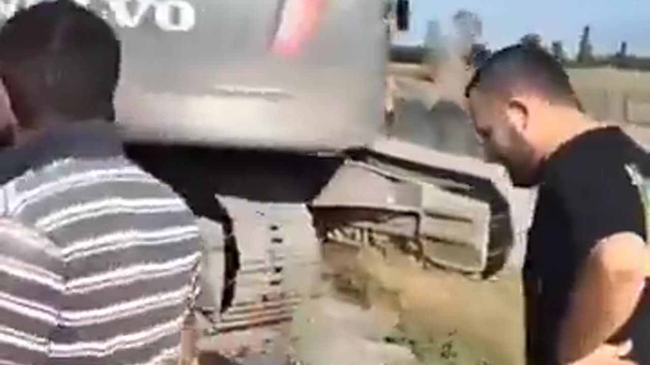 A crane operator saves a cow who fell in a water canal with incredible timing.