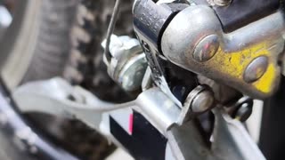 I applied grease to the front derailleur of my bike, made some adjustments, and it works fine