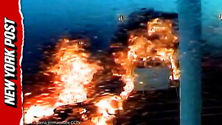 Moment huge flames erupt as container ship slams into oil tanker