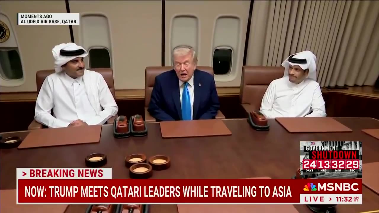 Trump meets Emir of Qatar on Air Force One.