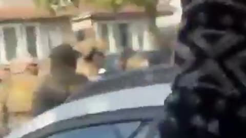 Ground view of the local terrorists in Southeast Chicago throwing things at DHS