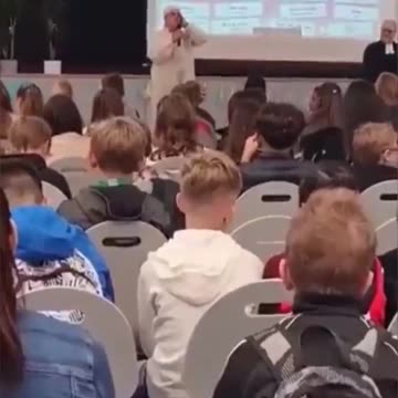 Young white German school kids forced to listen to a muslim sing to ALLAH
