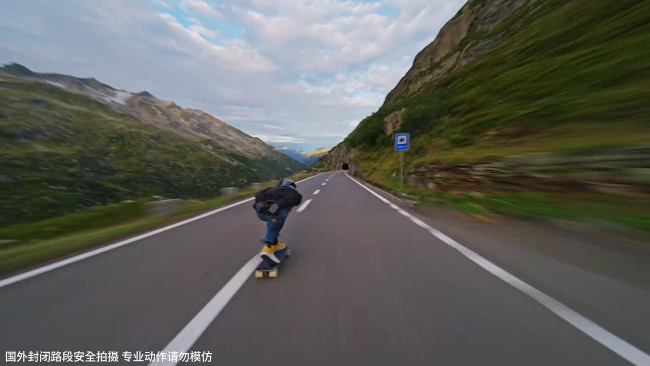 Scenic view of skating on the road between two mountains video 2025 skc.com 20