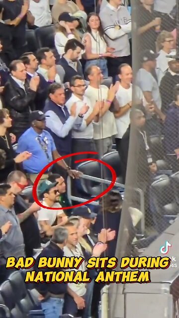 Bad Bunny remained seated during the National Anthem.