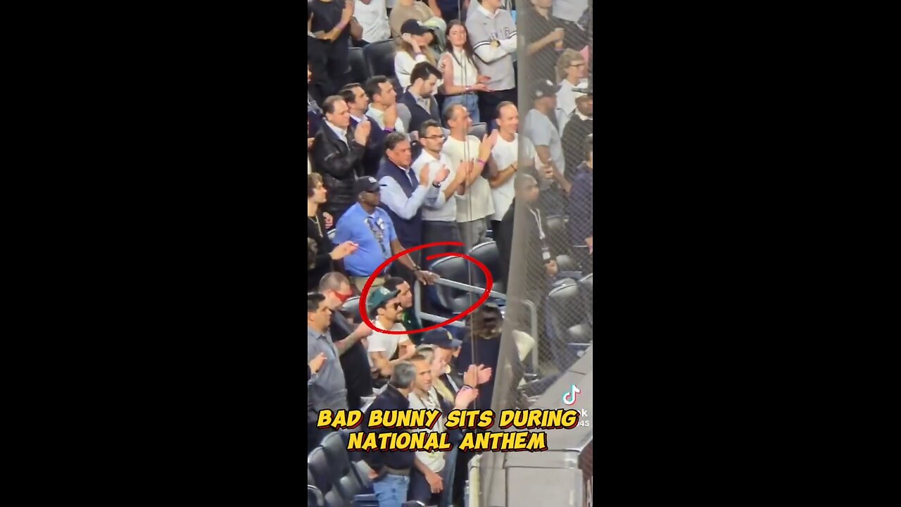 Bad Bunny remained seated during the National Anthem.