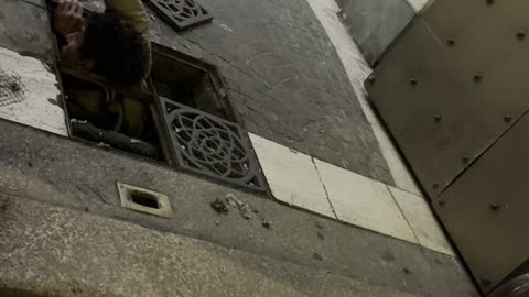 Italian Man Pops Out of Manhole