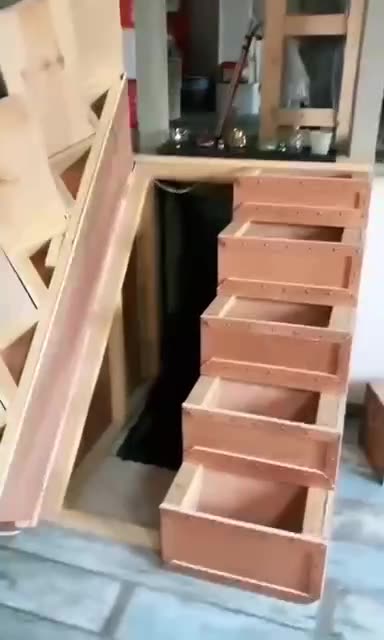 The entrance to the basement disguised as a staircase.