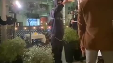 Masked Antifa antagonizes a man at a restaurant and gets DROPPED.