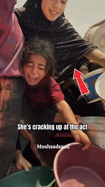 This poor Gazan girl is suffering so much that she can't hold her laughter. FAKE "PALESTINE"!