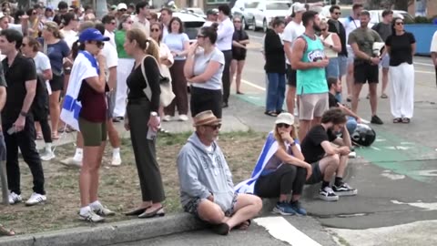 Australia vows stricter gun laws as police say father and son kill 15