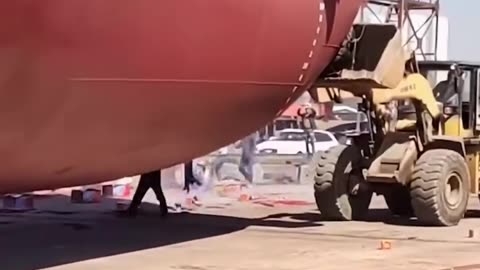 The launching of a massive ship.hd