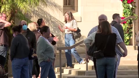 LA residents whose church in wildfires burned attend mass nearby