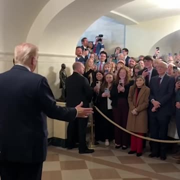 WARM WELCOME: President Trump makes a surprise appearance on the first White House