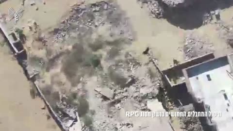 Two Hamas operatives armed with an RPG and another firearm who approached troops
