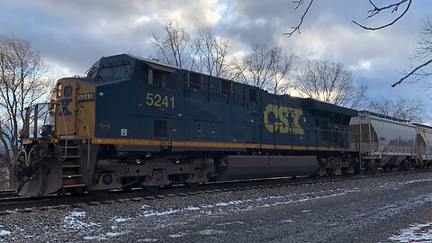Long CSX Train led by 5241 with a DPU