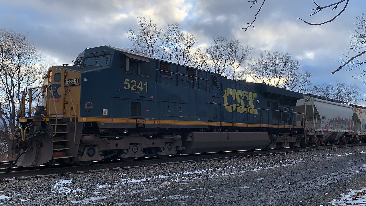 Long CSX Train led by 5241 with a DPU