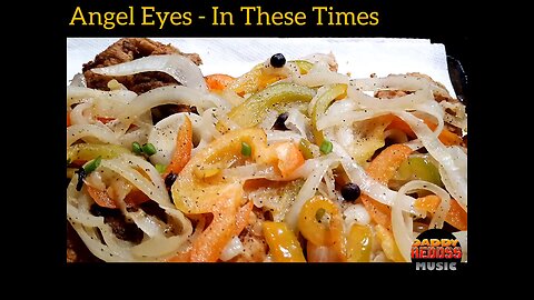 Angel Eyes - In These Times - Escovitch Fish with chicken fettuccine Alfredo.