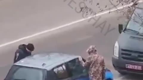 In "Free Ukraine" a civillian who refused to fight for the Dictatorship locks himself inside his car