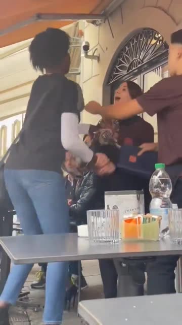 Black attacks Italian woman