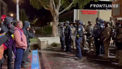 PORTLAND- ICE agents retreat back into the facility after arresting an ANTIFA member.