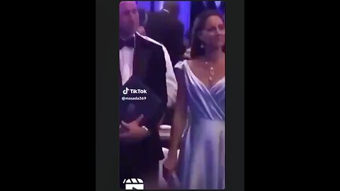 What in the world is moving around under her dress? It's alive...