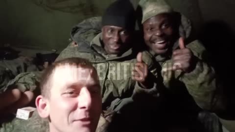 African Mercenaries All Smiles Before Reaching Front Lines