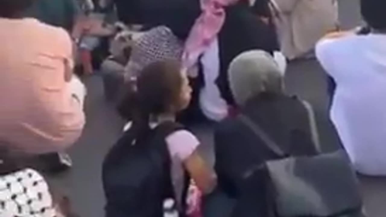 A driver of a vehicle in Switzerland ran through a crowd that was blocking the road.