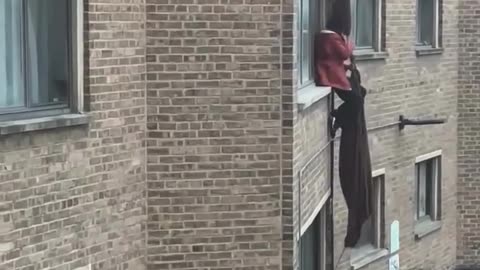 Chicago: A woman was captured on camera climbing a building at Parkway Gardens (O’Block)