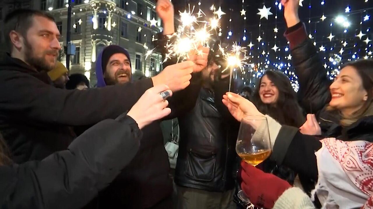 Thousands celebrate new year in front of parliament in Georgia capital