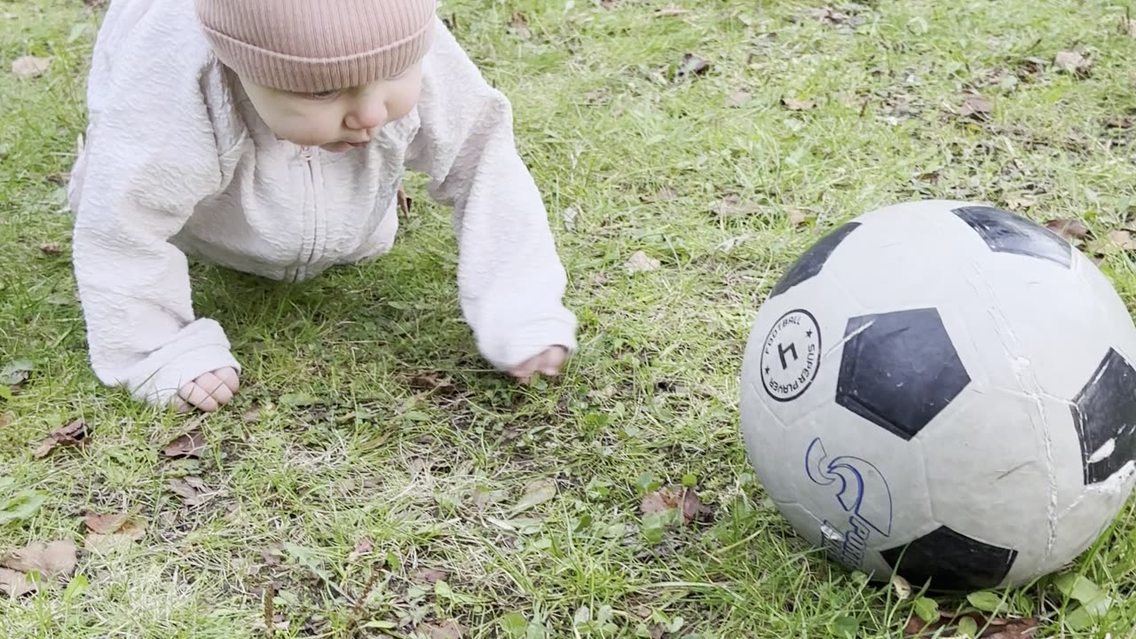 Garden fun 🌿⚽ Baby Kayla chasing a ball