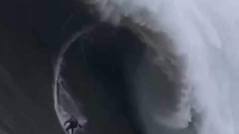 Surfer Alessandro Slebir broke world record riding a 32-meter wave