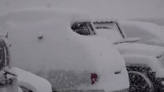 Parts of Japan covered in heavy snow, disrupting traffic