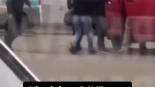 Ukrainian citizens rush to save a man from police nabbing males off the street to fight in war