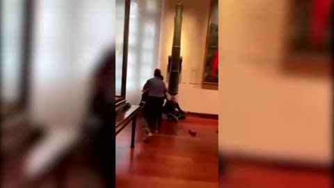 Activists threw paint on Jose Garnelo’s painting ‘First Tribute to Christopher Columbus’