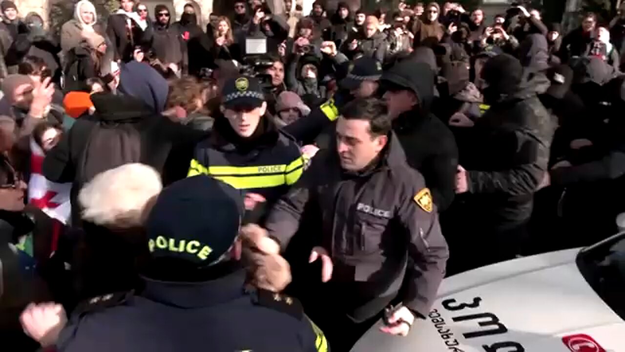 New Georgian president sworn in amid protests against legitimacy