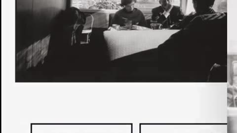 WHAT DOES THIS SIGN BEHING JFK AND JACKIE LOOK LIKE TO YOU???