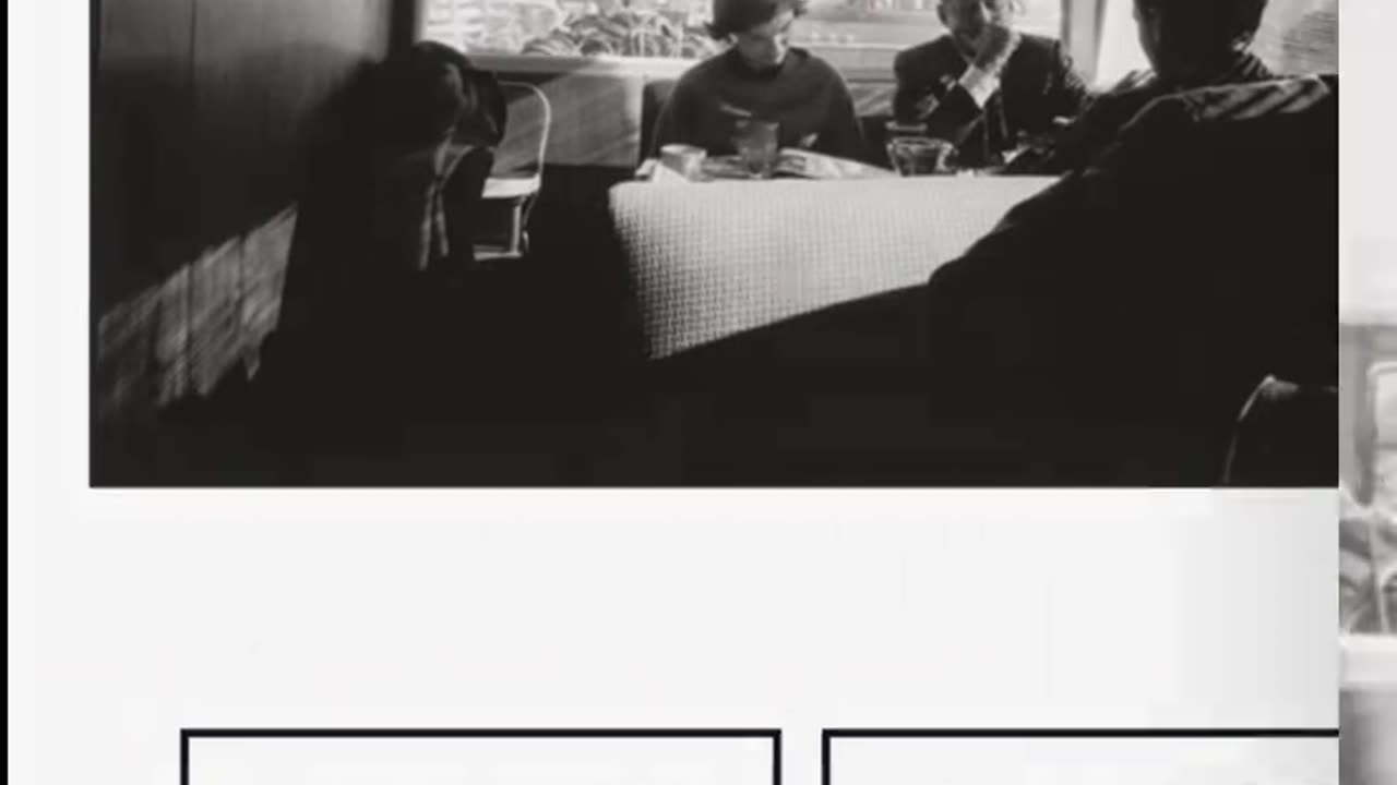 WHAT DOES THIS SIGN BEHING JFK AND JACKIE LOOK LIKE TO YOU???