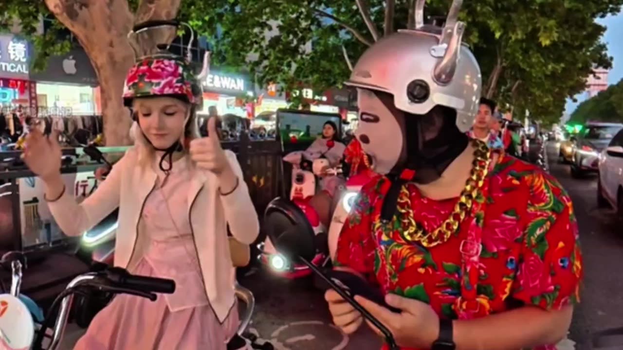 Even without a helmet, European girl gets lectured by officer
