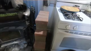Cabin Life_ Efficient Wood Stove & Gravity Feed System Explained! #livingoffgrid