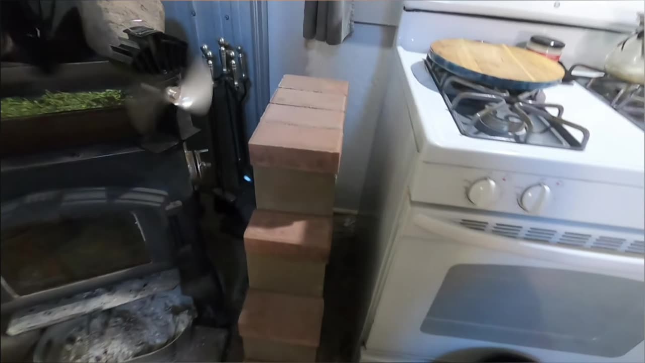Cabin Life_ Efficient Wood Stove & Gravity Feed System Explained! #livingoffgrid