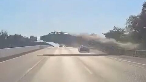 Man suffers seizure while driving, launched above the highway.