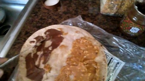 Making PB n Honey n Hazelnut n Pita Snack
