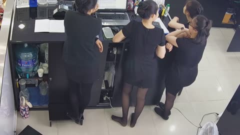 Sales ladies behind the counter...